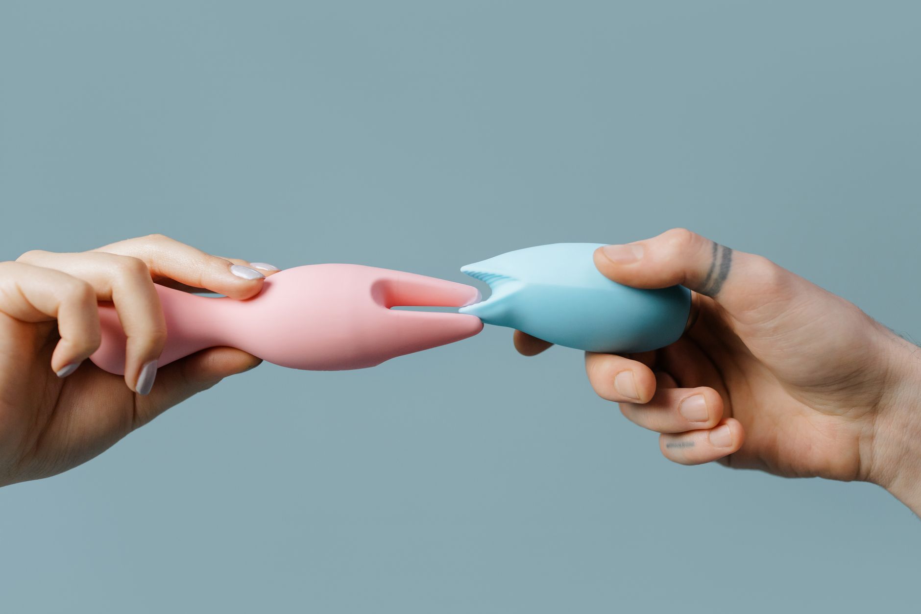 Array of vibrant clitoral vibrators in close-up, representing the full spectrum of tools available for pleasure rediscovery